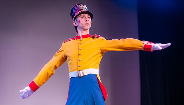 actor with Nutcracker costume on stage