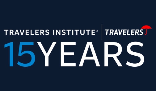 Travelers Institute 15 Years logo